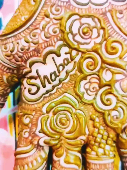 For bride Daniya, I included her groom's name, 'Shabaz', in a beautiful cloud-like motif on her palm.