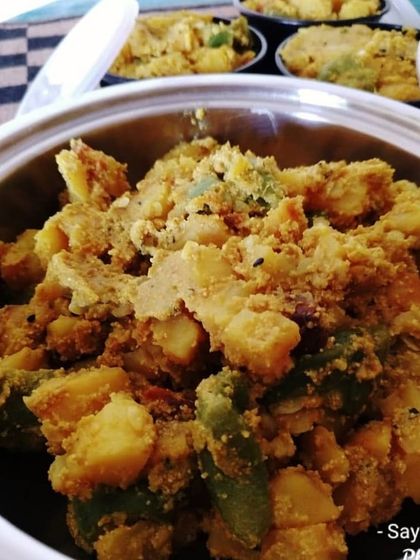 Aloo Jhingey Posto, a famous Bengali dish of potatoes and ridge gourd in a poppy seed paste. It's a humble preparation that is incredibly satisfying, especially during the summer.