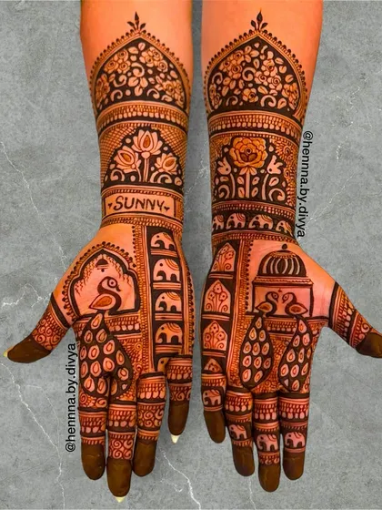 A personalized bridal mehendi with the groom's name, 'Sunny', on one palm. The design is filled with traditional peacock, elephant, and palace motifs.