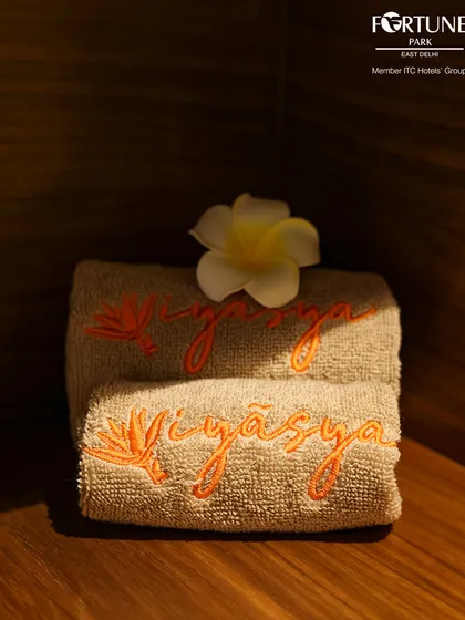 Every detail is considered, right down to the plush, embroidered towels carrying the Iyasya name, signifying the quality and care I put into your spa experience.