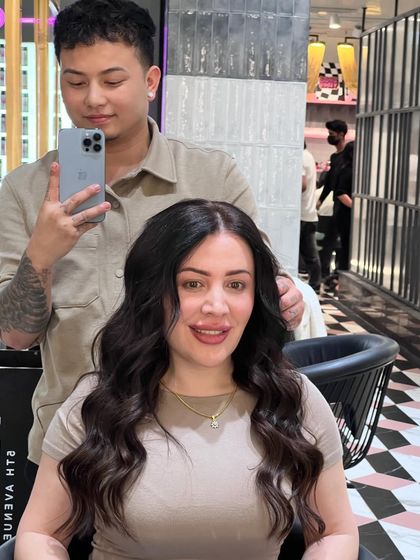 Don't waste a good hair day. Here I am with a client, making sure her hair is styled to perfection.