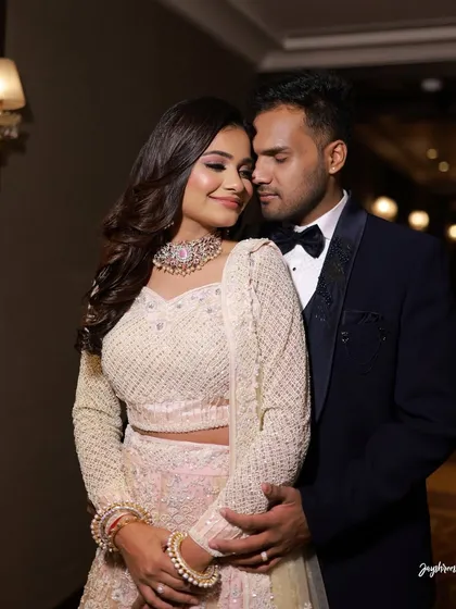 A romantic portrait of the couple, ready for their reception party.