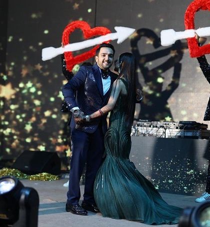 A beautiful couple's performance with props and backup dancers, creating a truly theatrical moment.