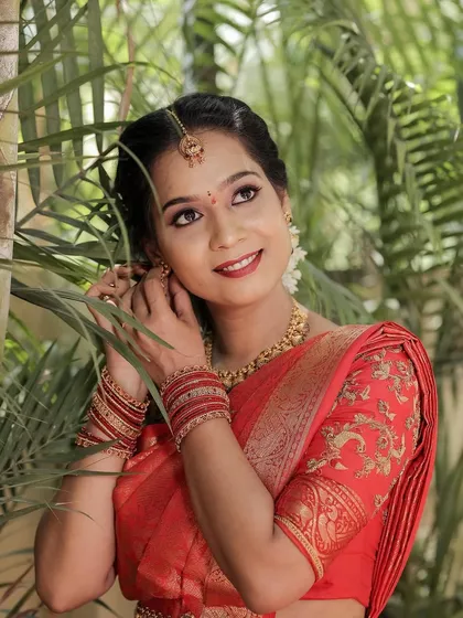 A candid shot of the client, looking beautiful with her traditional hairstyle.
