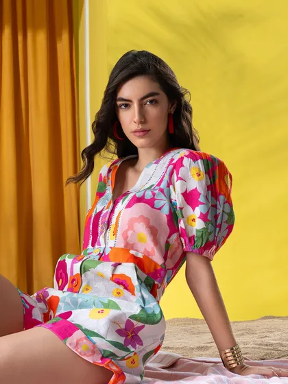 A close-up portrait from the Boho-Chic shoot, focusing on the vibrant floral print and the model's expression.