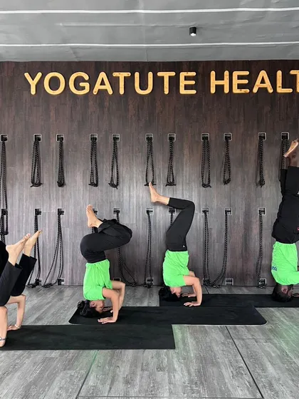 A sequence of headstand variations performed by our teacher trainees. This demonstrates the progression from foundational poses to more advanced expressions of Sirsasana, all built on a foundation of safety.