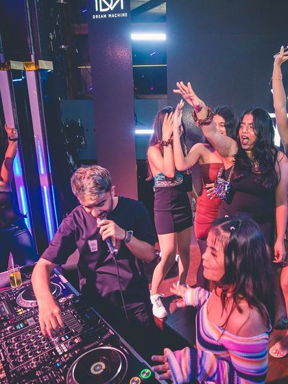 Interacting with the crowd from the DJ booth. I often bring people up to the console to make them feel like a part of the show.