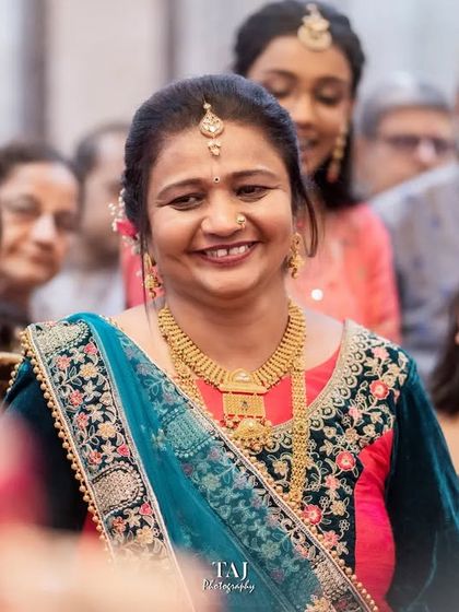 Even through tears, a mother's smile shines with pride and love for her daughter. Capturing this mix of emotions is key to telling the true story of the Bidai.