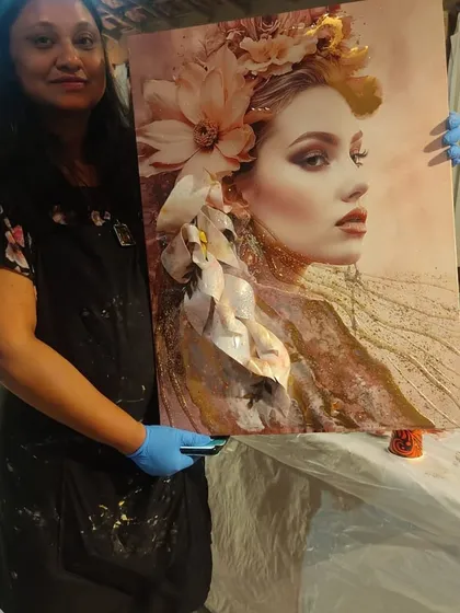 I am holding a finished 3D photo resin art piece from one of my workshops. You can learn to create these beautiful, layered effects in my upcoming sessions.