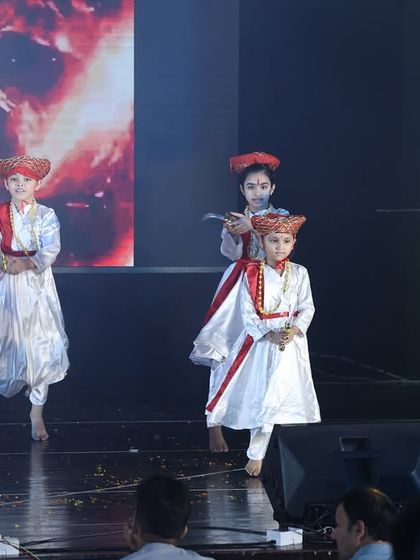 Our young performers showcasing their intensity and focus during the "Tanaji" act. We use authentic costumes and expressions to bring historical characters to life.
