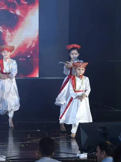 Our young performers showcasing their intensity and focus during the "Tanaji" act. We use authentic costumes and expressions to bring historical characters to life.