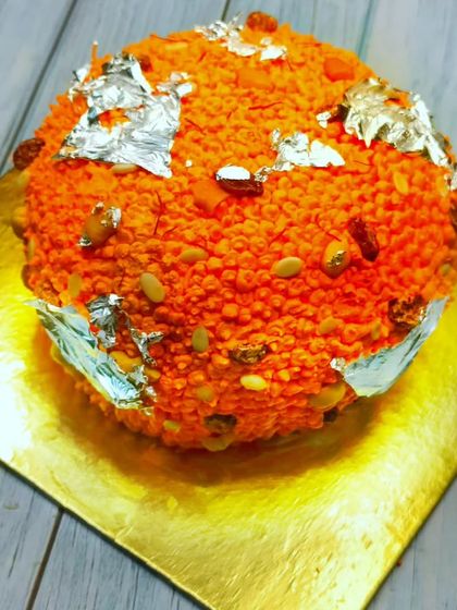 A close-up of the Motichoor Laddu cake from our advanced course, decorated with edible silver leaf.