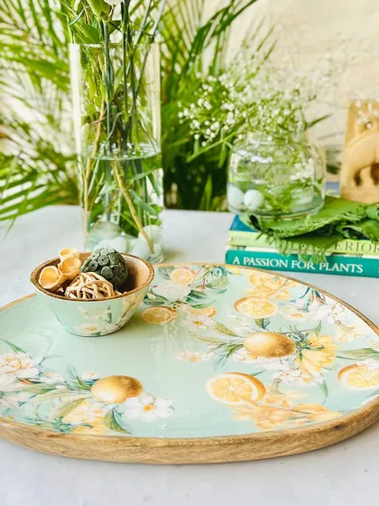 Our Lisbon Lemon collection also includes this unique chip-and-dip platter. The minty hue and sunny lemon print make it a stylish and functional piece for casual entertaining.