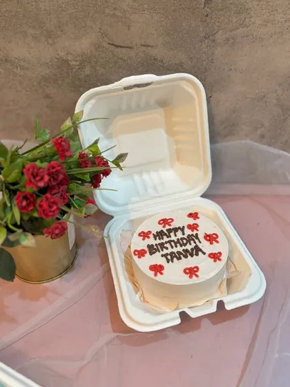 This birthday bento cake for "Tanya" features a cute and simple design with little red bows, all packed in my signature eco-friendly box.