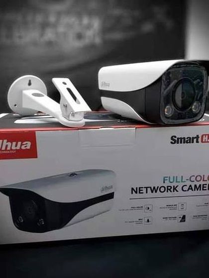 The Dahua Full-Color Network IP Camera, shown here with its packaging. This camera uses Smart H.265 compression to save storage space while delivering vibrant color footage, even at night.