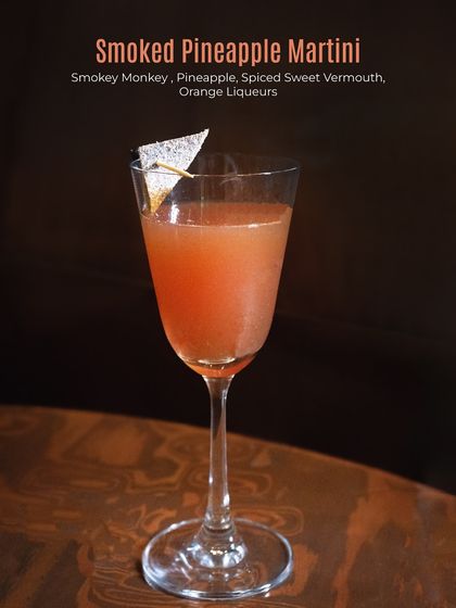 From our Monkey Shoulder menu, the Smoked Pineapple Martini. This cocktail blends smoky whisky with pineapple, spiced sweet vermouth, and orange liqueurs for a tropical, smoky flavour.