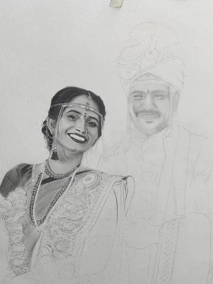Here, the bride's portrait is partially shaded, showing the careful layering of graphite I use to create the texture of her saree and the shine of her jewelry.