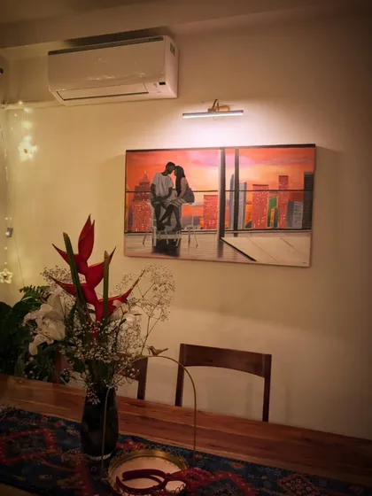 It is incredibly rewarding to see a commissioned painting in its new home. I created this piece for a client in Singapore, capturing a personal moment against the city's sunset, turning their cherished memory into lasting wall art.