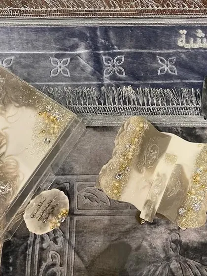 This video showcases the details of my silver-themed Islamic gift set. It includes a Quran holder and box with a beautiful silver and white resin pour, a crystal tasbeeh, car hanging, and a premium prayer mat.