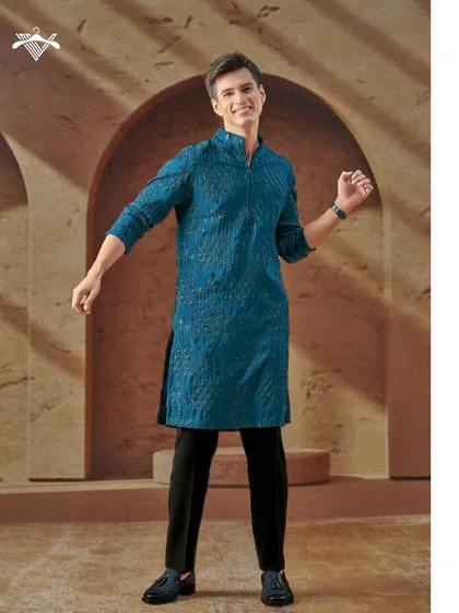 Radiate charm in this intricately detailed teal kurta. The unique texture and modern zip-front design make it a standout piece for any celebration.