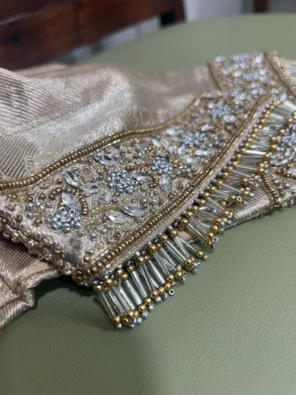 Another angle of the crystal and tassel embroidery, showcasing the fine craftsmanship.