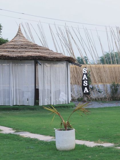 Our cabanas are designed to blend in with the natural, rustic aesthetic of the property. This one stands on the lawn, offering a quiet retreat.