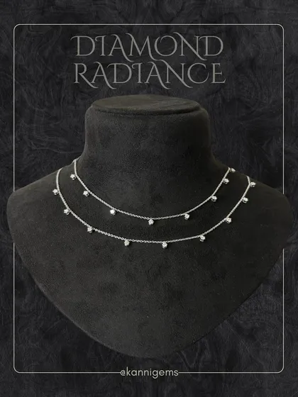 A studio shot of the double-layered diamond necklace on a bust, highlighting its elegant drape and sparkle. This piece is crafted to shine with you, whether worn solo or layered.