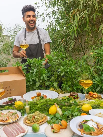 We partner with culinary masters like Chef Dhruv Oberoi to bring you exclusive menus. This image captures the joy and abundance of his 'An Italian Affair' spread, highlighting the passion and expertise behind every dish we offer.