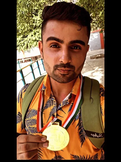 Celebrating a big win. Here is our student Rishabh Tyagi after securing a Gold medal in the senior men's category at the North District shooting competition with an impressive score of 373/400.