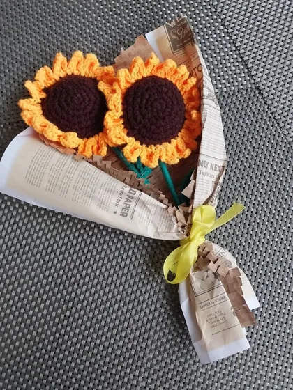 A lovely two-sunflower bouquet, wrapped in vintage-style paper.