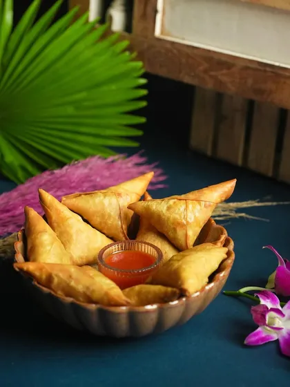 My Chicken Irani Samosas are a Ramadan and party favorite. The thin, crispy pastry is filled with flavorful minced chicken, perfect for sharing.
