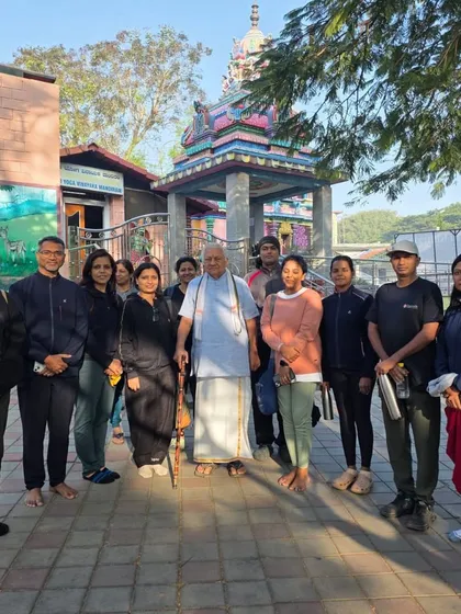 Our team with a revered guru during our visit to Bangalore, a moment of receiving blessings and wisdom.