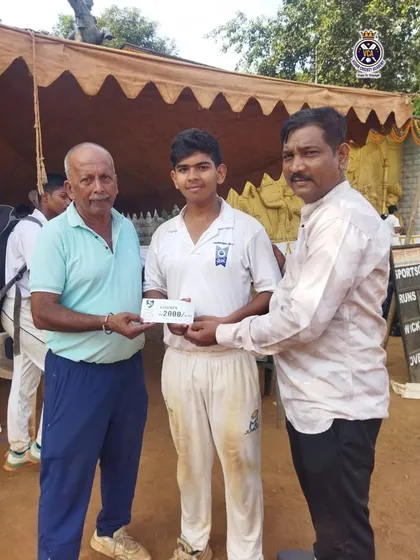 A century in a major school tournament. Nilesh Sharma is awarded for his brilliant 130 runs for his school during the Harris Shield tournament.