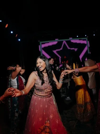 Pure joy and energy on the dance floor during the 'Night on the Nile' Sangeet celebration.