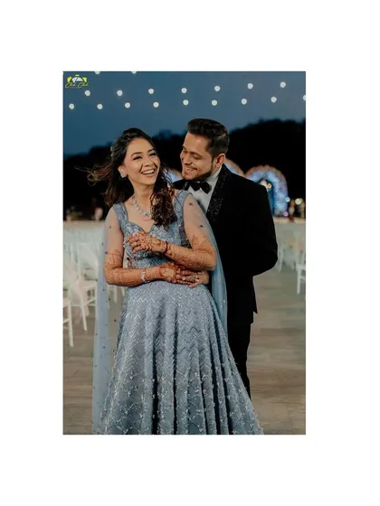 This portrait captures the fun and mischievous energy of Dhwnai and Niraj. Their laughter is a testament to the joy they find in each other's company.