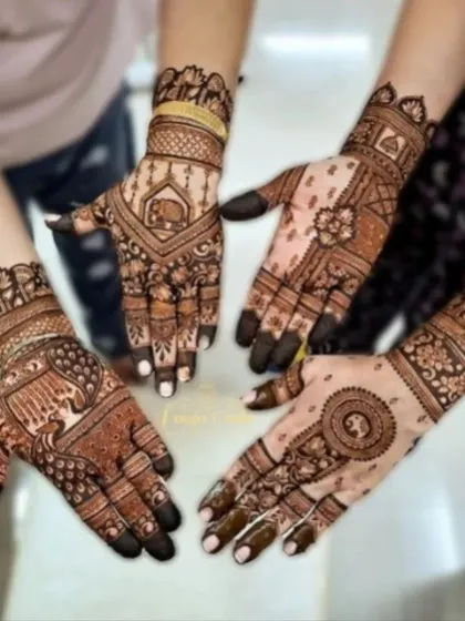 A showcase of coordinated mehandi for the bride tribe. Each hand has a unique yet complementary design, featuring elephants, peacocks, and floral patterns.