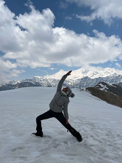 A variation of reverse warrior, feeling the stretch along my side body while gazing at the clouds. Each breath of fresh mountain air deepens the posture and enhances the feeling of being alive and present.