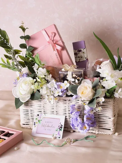 This is my Lavender Treasure Hamper for Rakhi. It’s designed to be a complete sensory experience, combining decadent treats like brownies and bonbons with beautiful flowers and a handcrafted rakhi.