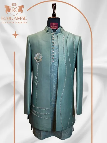 A full view of the pastel green ensemble, showcasing its unique cut and refined embroidery. A perfect choice for a man with a classy, understated style.