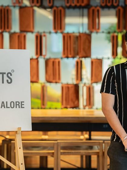 A smiling performer at our "Seasons" event. The community's response to the theme was creative and heartwarming.