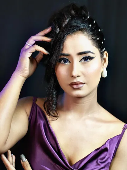 A confident pose that captures the edgy and fashionable vibe of this student's creation.