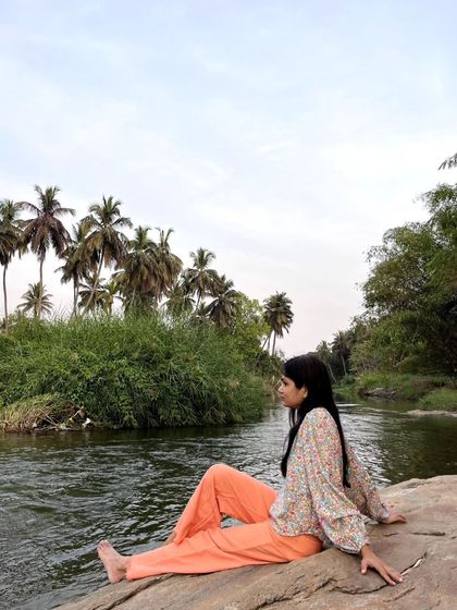 Relaxing on the rocks and enjoying the peaceful scenery. This is the kind of environment I seek for my healing art retreats.