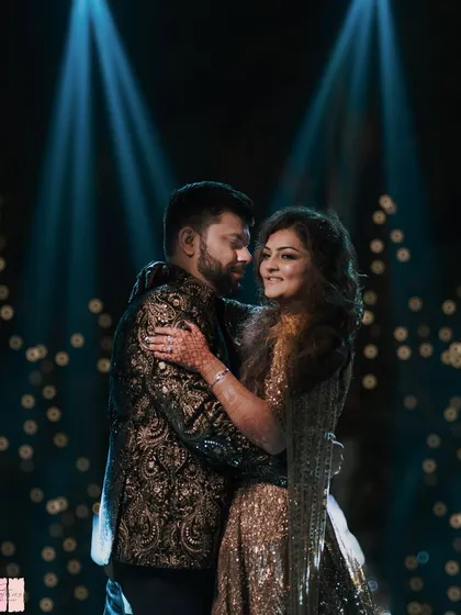 A Sangeet night is all about the celebration, and I ensure the focus is on you. This shot captures the pure joy of a couple's dance, with dramatic spotlighting and an electric atmosphere that I design to match your energy.