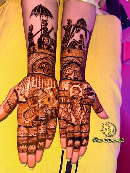 Another angle of the same intricate bridal mehandi, showing the different story elements on each hand.