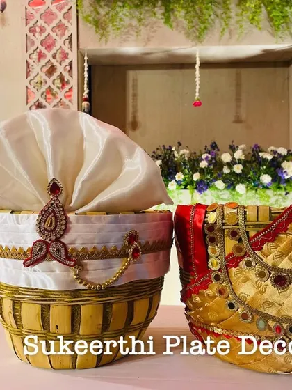 My custom-decorated Uppukudai, or ceremonial salt baskets. I design them to represent the bride and groom, using rich fabrics, mirror work, and elegant embellishments, adding a beautiful symbolic touch to wedding rituals.