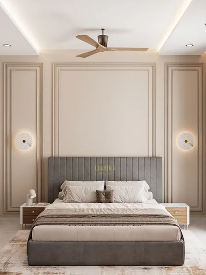 A European-inspired parents' bedroom design for ATS Rhapsody. The walls are adorned with elegant trim mouldings, and the space includes a beautifully designed mandir for spiritual reflection.