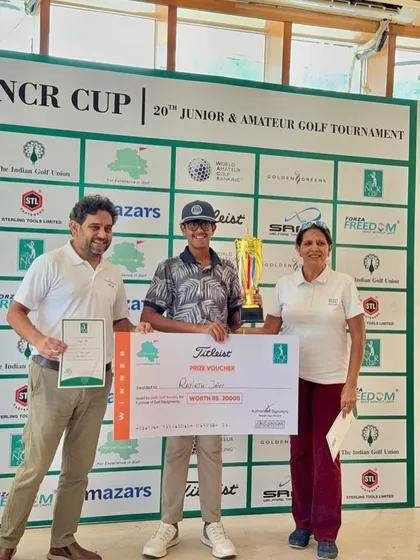 Rayirth Jain receives his winner's trophy and prize at the 20th NCR Cup. This marked his third consecutive win, a testament to his consistent excellence in the junior golf circuit.