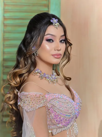 A beautiful portrait showcasing the floral necklace and matching earrings.