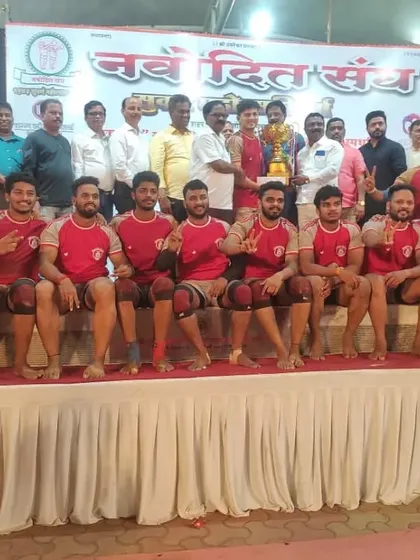 Posing with the runners-up trophy, our players show pride in their performance.