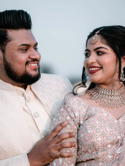 A happy, candid moment between the newly engaged couple. We love capturing these unposed interactions that show the real love and connection.